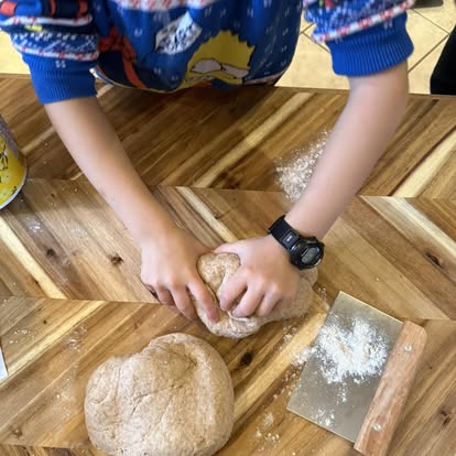 Hands-On Baking - Kneading dough during a cooking activity
